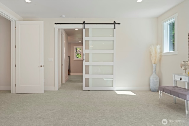 interior space featuring a healthy amount of sunlight, carpet flooring, and recessed lighting