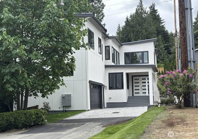 955 103rd Ave SE, Bellevue, WA 98004 - view of front of house with a garage and driveway