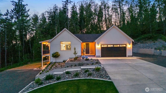 5601 Lewis River Rd, Ariel, WA 98603 - single story home with an attached garage and concrete driveway