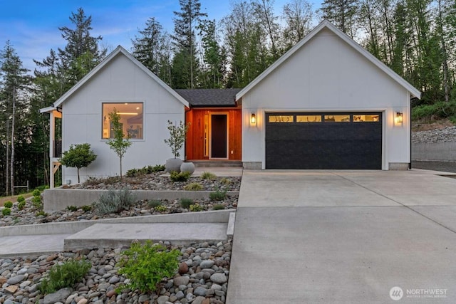 5601 Lewis River Rd, Ariel, WA 98603 - view of front of home with a garage and concrete driveway