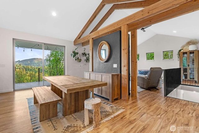 5601 Lewis River Rd, Ariel, WA 98603 - dining area with vaulted ceiling and light wood-type flooring