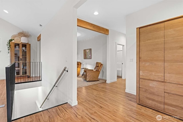 5601 Lewis River Rd, Ariel, WA 98603 - hall with an upstairs landing, light wood finished floors, baseboards, and recessed lighting
