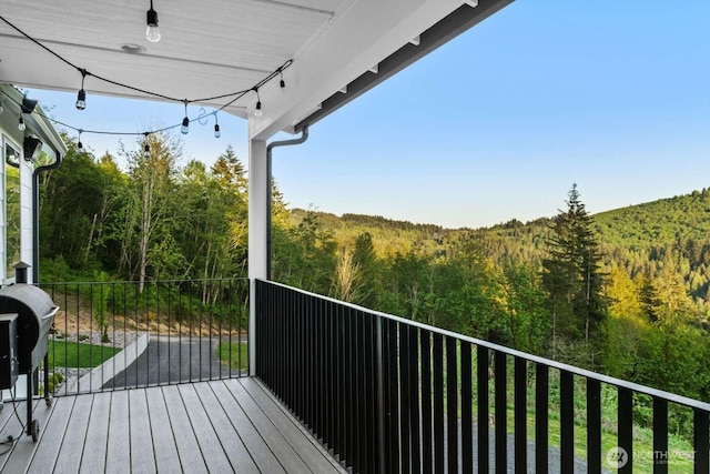 5601 Lewis River Rd, Ariel, WA 98603 - wooden deck with a forest view