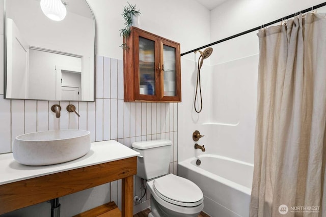 5601 Lewis River Rd, Ariel, WA 98603 - bathroom featuring shower / tub combo, toilet, tile walls, and vanity