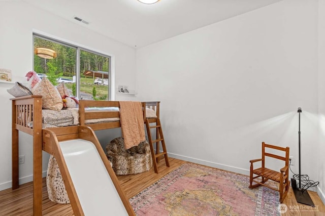 5601 Lewis River Rd, Ariel, WA 98603 - bedroom featuring wood finished floors and baseboards