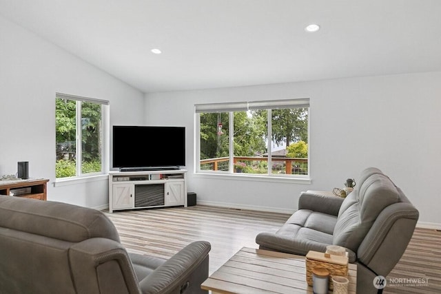155 Baldwin Ln, Port Ludlow, WA 98365 - living room featuring baseboards, vaulted ceiling, light wood-style floors, and recessed lighting