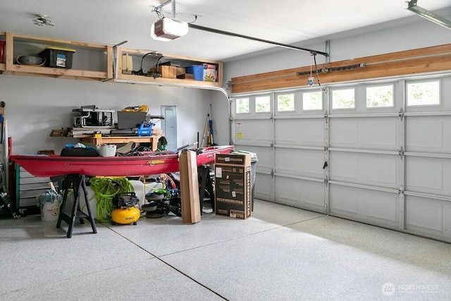 155 Baldwin Ln, Port Ludlow, WA 98365 - garage featuring a garage door opener