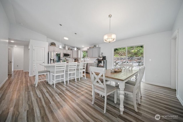 155 Baldwin Ln, Port Ludlow, WA 98365 - dining area featuring vaulted ceiling, light wood finished floors, baseboards, and recessed lighting