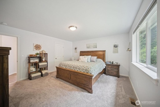 155 Baldwin Ln, Port Ludlow, WA 98365 - bedroom featuring light carpet and baseboards