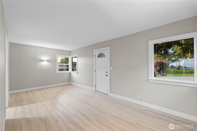504 107th St S, Tacoma, WA 98444 - unfurnished room with baseboards and wood finished floors
