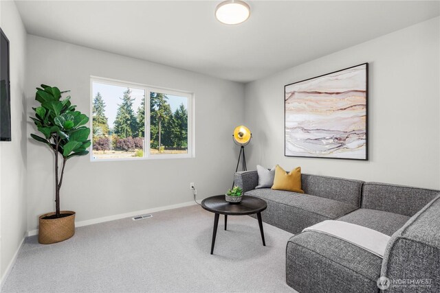 13826 Brookdale Ln E Unit 96, Tacoma, WA 98445 - carpeted living room featuring baseboards and visible vents