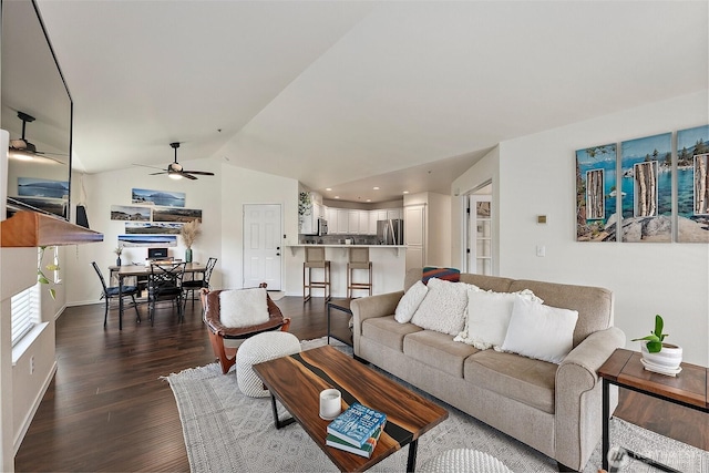living area with a ceiling fan, dark wood-style flooring, baseboards, lofted ceiling, and recessed lighting