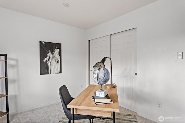 office area with baseboards and carpet