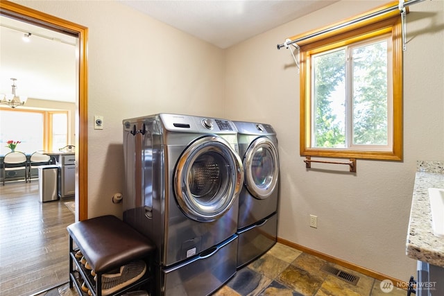 2995 Haynie Rd, Custer, WA 98240 - washroom featuring washer and clothes dryer and baseboards
