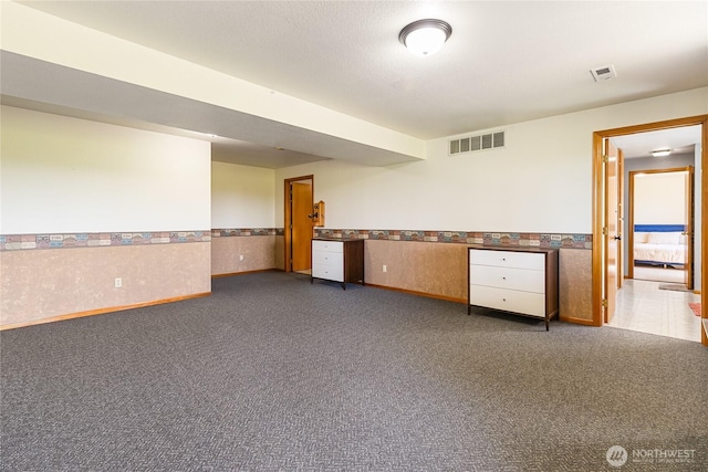 2995 Haynie Rd, Custer, WA 98240 - spare room featuring wainscoting, dark colored carpet, and baseboards
