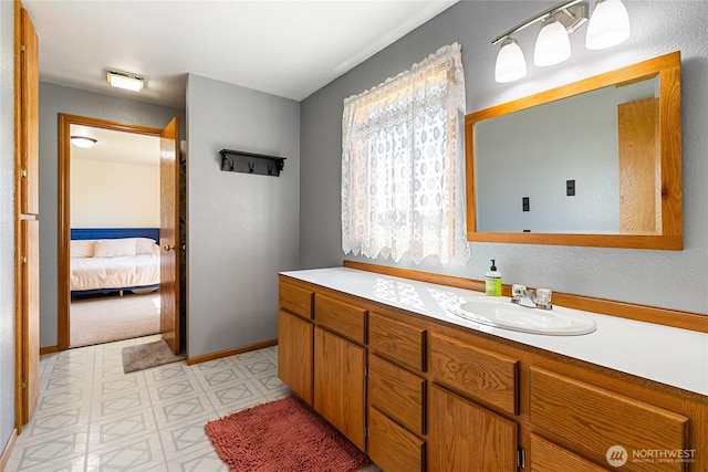 2995 Haynie Rd, Custer, WA 98240 - ensuite bathroom with baseboards, vanity, and tile patterned floors