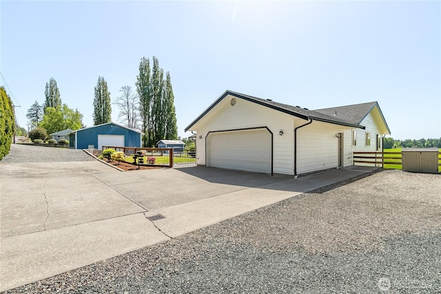 2995 Haynie Rd, Custer, WA 98240 - view of side of home with fence, driveway, and a garage