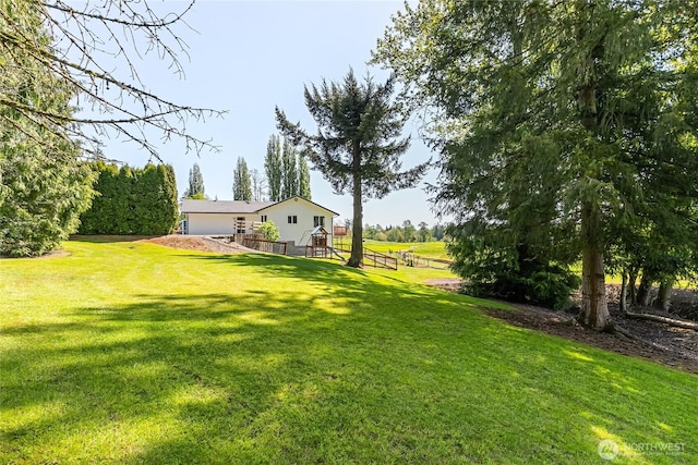 2995 Haynie Rd, Custer, WA 98240 - view of green lawn with a deck