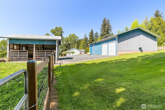 2995 Haynie Rd, Custer, WA 98240 - view of yard with an outdoor structure, an exterior structure, a pole building, and a detached garage