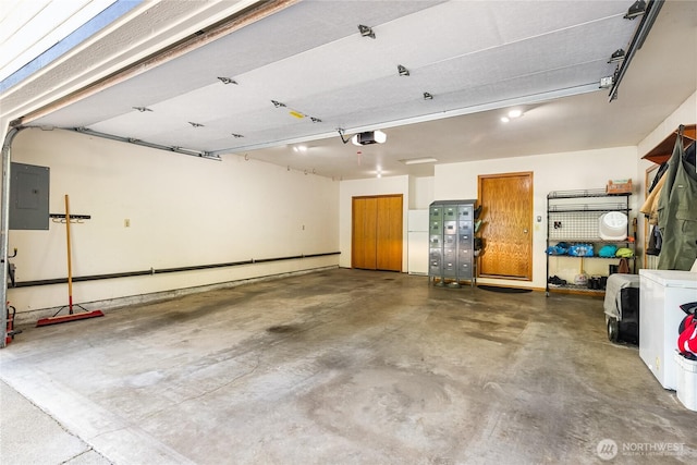 2995 Haynie Rd, Custer, WA 98240 - garage featuring a garage door opener and electric panel