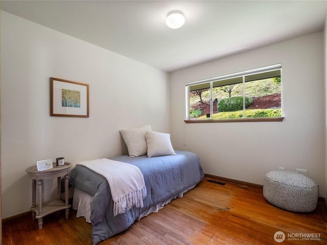 16631 Sylvester Rd SW, Burien, WA 98166 - bedroom with light wood-type flooring and baseboards