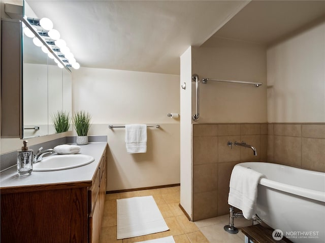 16631 Sylvester Rd SW, Burien, WA 98166 - full bath featuring tile patterned flooring, vanity, and a soaking tub