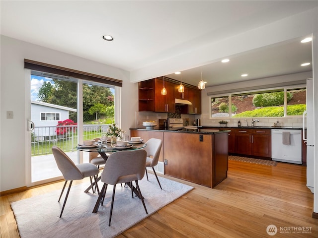 16631 Sylvester Rd SW, Burien, WA 98166 - dining room featuring light wood-type flooring, recessed lighting, and a wealth of natural light