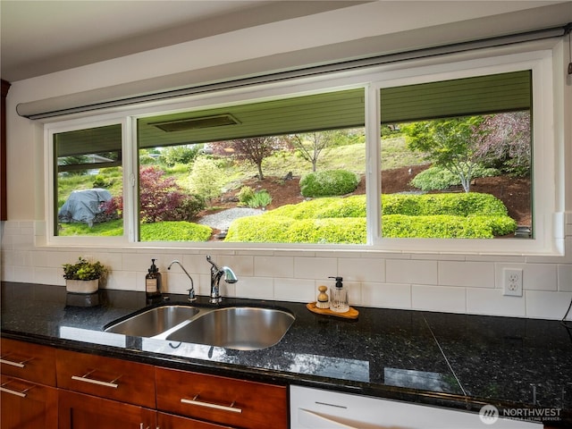 16631 Sylvester Rd SW, Burien, WA 98166 - kitchen featuring decorative backsplash, a sink, and plenty of natural light