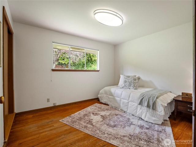 16631 Sylvester Rd SW, Burien, WA 98166 - bedroom featuring baseboards and wood finished floors