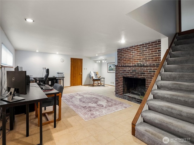 16631 Sylvester Rd SW, Burien, WA 98166 - living area with a brick fireplace, recessed lighting, light tile patterned floors, and stairs