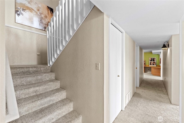 1014 Westmorland Dr, Wenatchee, WA 98801 - staircase with carpet flooring and a textured wall