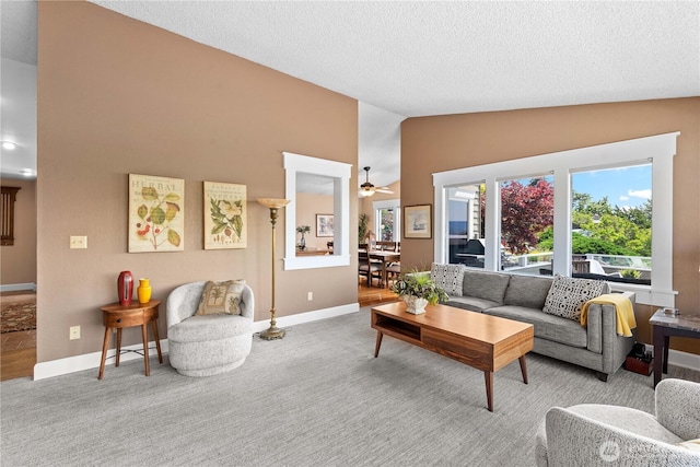 1014 Westmorland Dr, Wenatchee, WA 98801 - living room with baseboards, high vaulted ceiling, a textured ceiling, ceiling fan, and carpet