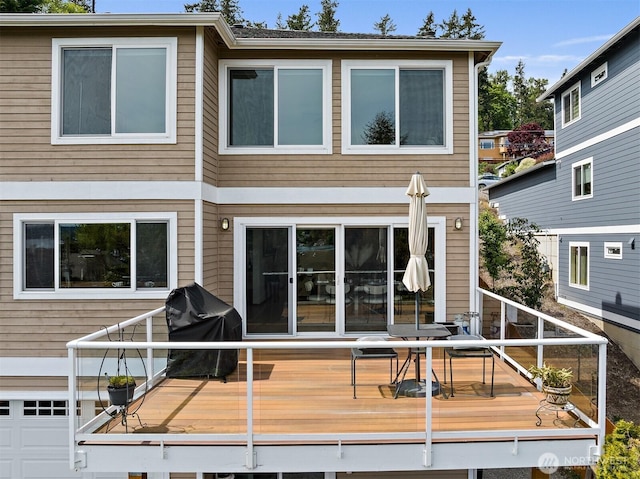 back of property with a deck