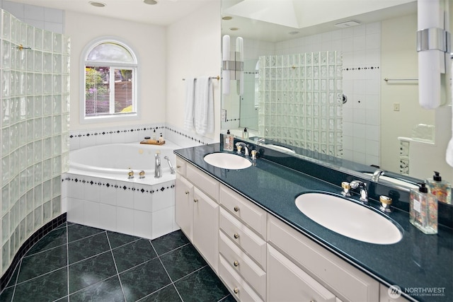 bathroom featuring a walk in shower, tile patterned floors, a bath, and double vanity
