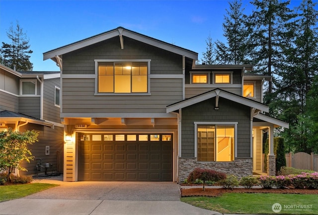 3530 128th St SE, Everett, WA 98208 - view of front of home with a garage, driveway, and stone siding