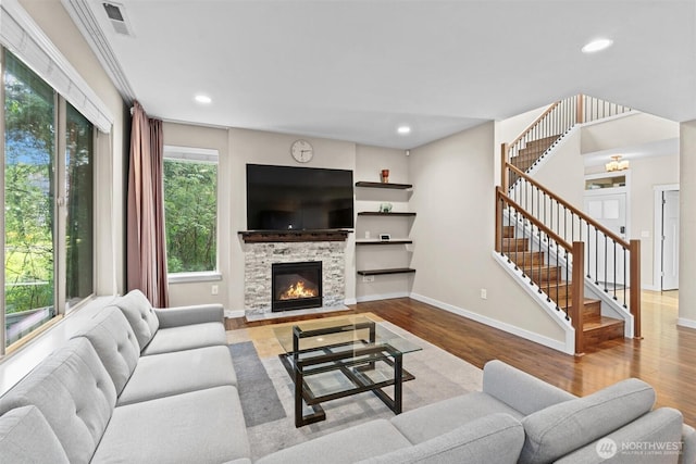 3530 128th St SE, Everett, WA 98208 - living room with wood finished floors, stairway, a fireplace, recessed lighting, and baseboards