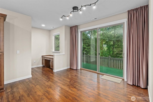 3530 128th St SE, Everett, WA 98208 - spare room with baseboards, dark wood-type flooring, recessed lighting, and a desk