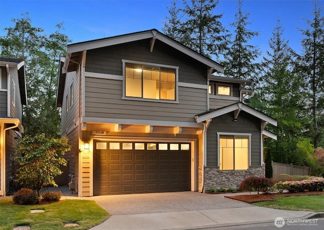 3530 128th St SE, Everett, WA 98208 - view of front facade featuring a garage, driveway, and stone siding