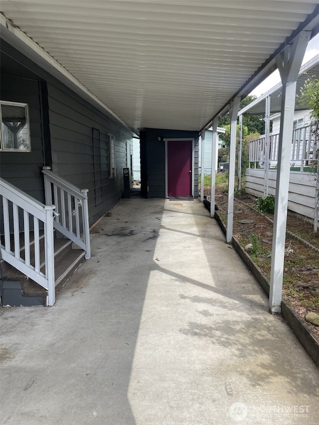 view of patio / terrace featuring an attached carport