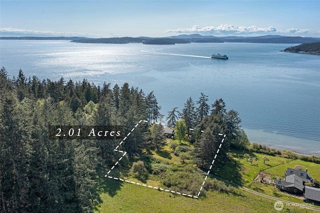 aerial view with a water and mountain view