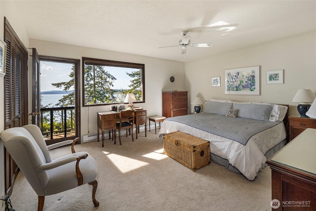 bedroom featuring carpet flooring, access to outside, and a ceiling fan