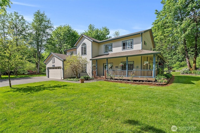 view of front facade featuring covered porch, driveway, a garage, and a front lawn