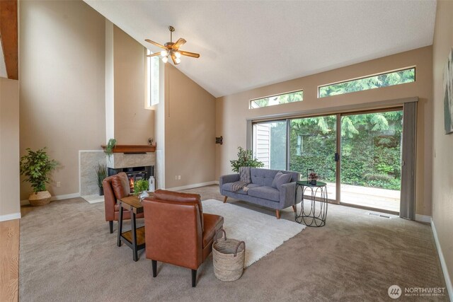 25432 213th Pl SE Unit 4, Maple Valley, WA 98038 - living room featuring carpet, a ceiling fan, high vaulted ceiling, a premium fireplace, and baseboards