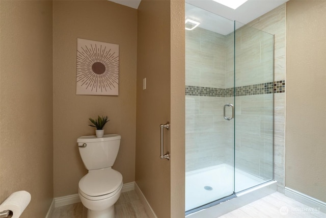 25432 213th Pl SE Unit 4, Maple Valley, WA 98038 - full bathroom with a shower stall, toilet, and baseboards