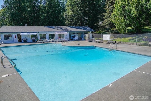 200 E Panorama Dr, Shelton, WA 98584 - community pool with a patio and view of wooded area