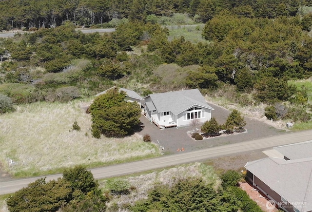 aerial view featuring a view of trees
