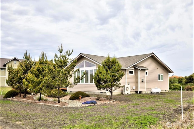 view of home's exterior featuring ac unit and crawl space