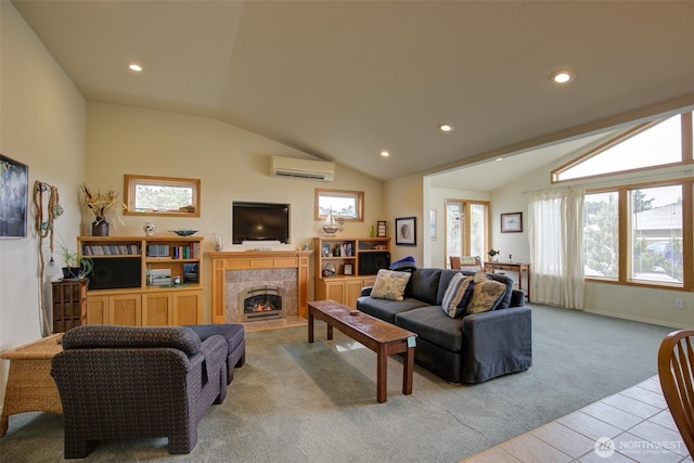 carpeted living room featuring a healthy amount of sunlight, vaulted ceiling, and a wall mounted air conditioner