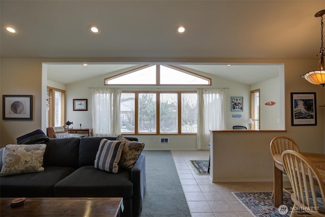 living room with visible vents, recessed lighting, light tile patterned floors, and lofted ceiling