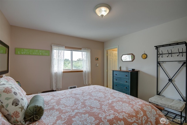 bedroom with visible vents